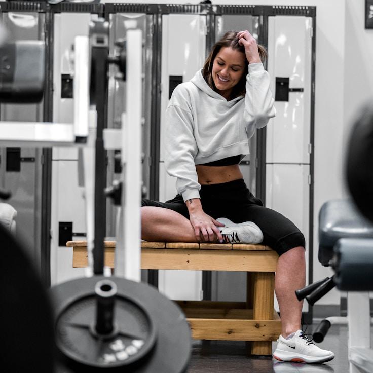 Women in a fitness class doing stretching and mobility exercises
